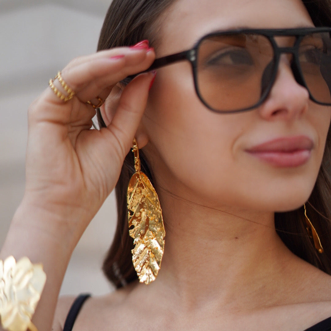 Pendientes mujer dorados y grandes.